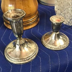 2 sterling candlesticks